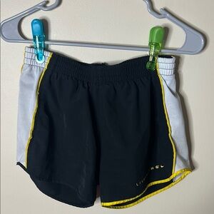 Black and White Athletic Shorts with Yellow Trim